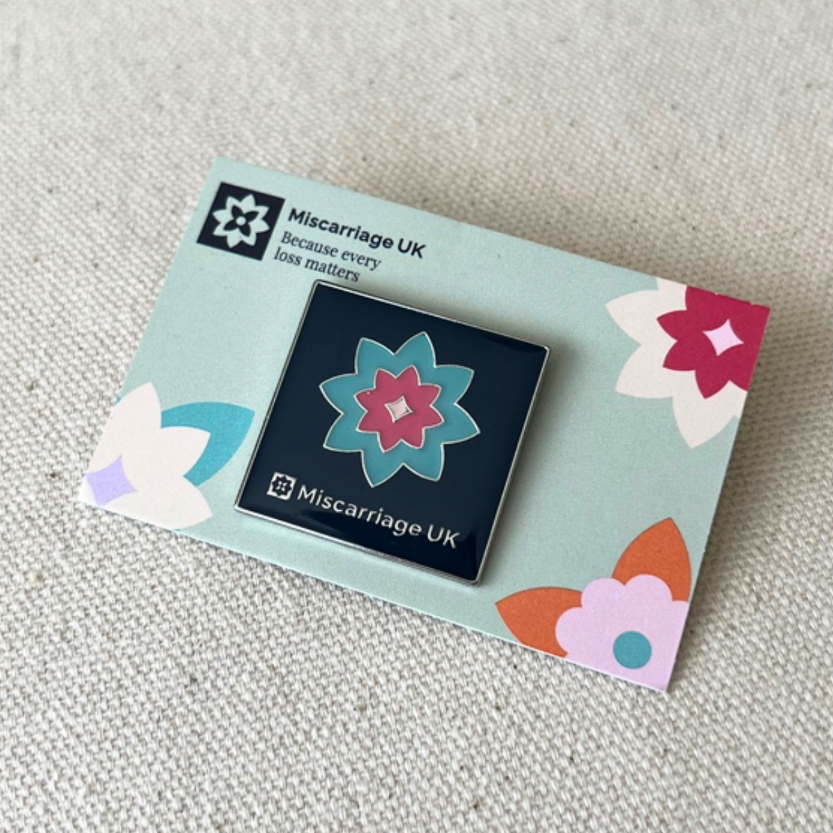 Miscarriage UK pin badge